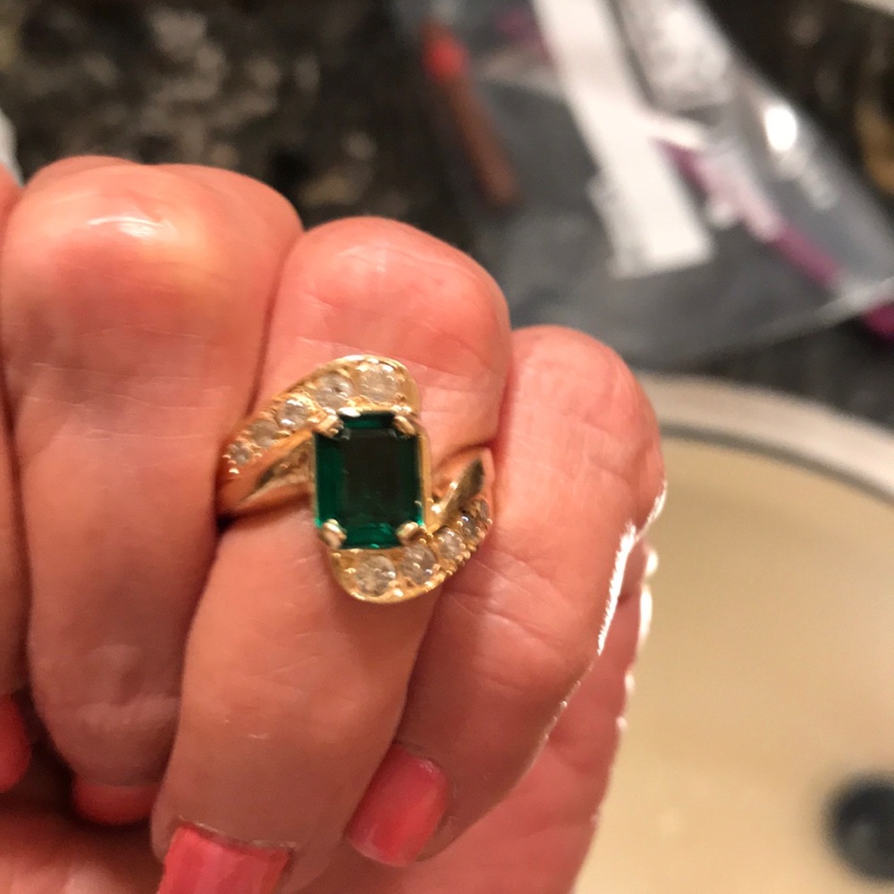 14k Gold diamond and emerald ring.